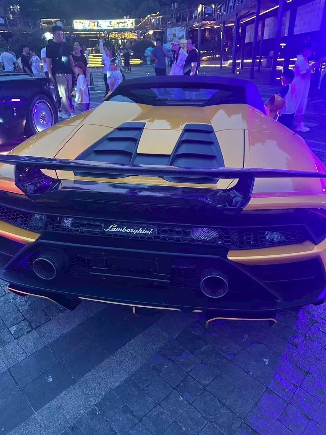 Gold Lamborghini Huracán at the supercar showcase